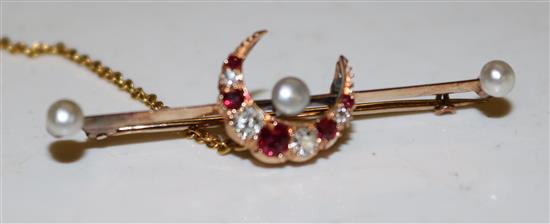 Gold , ruby and diamond pierced brooch